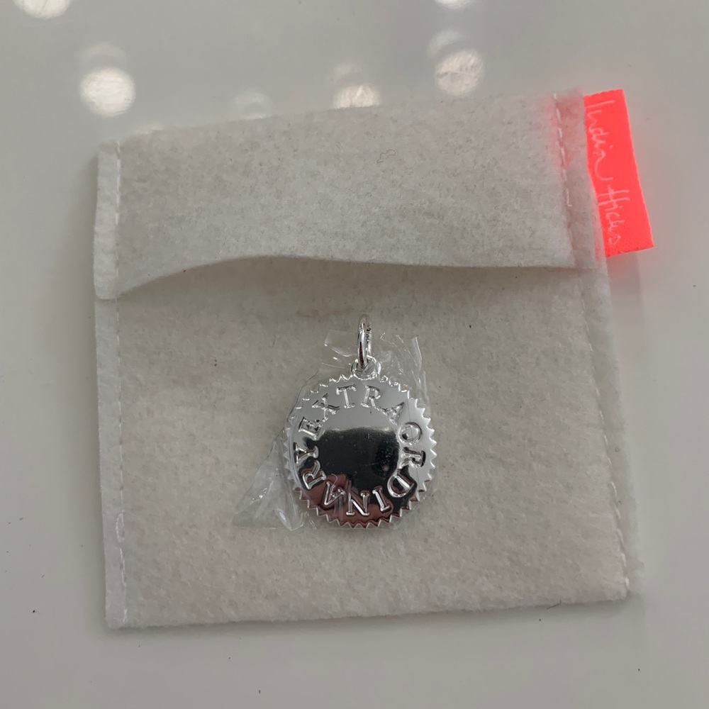 brand new India Hicks charm